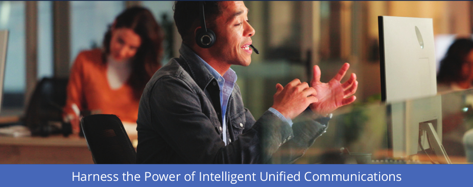 Professional in headset speaking in modern office, representing intelligent unified communications.